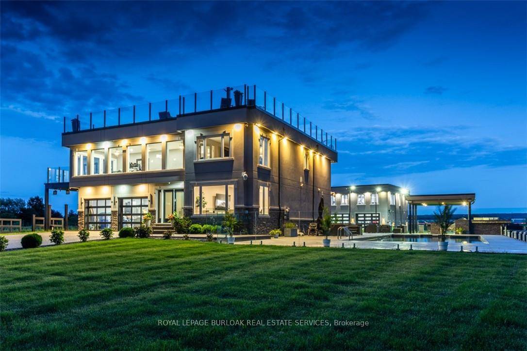 Experience unparalleled living in this extraordinary property overlooking Lake Ontario.