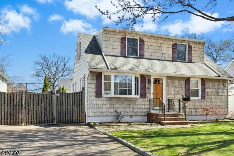 Welcome home to this fabulous expanded 5BR 2BA Cape tucked on a quiet dead end street in desirable Kenilworth !