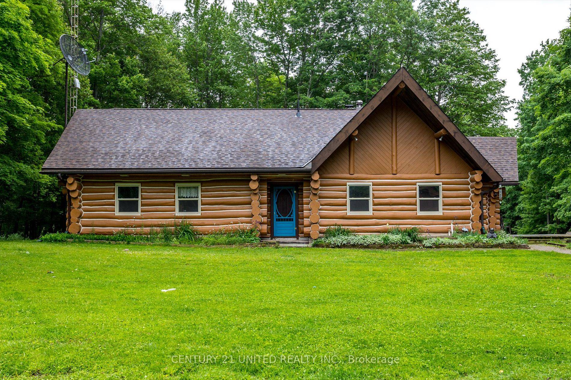 Escape to your private retreat nestled among the trees on a sprawling 32 acre estate, where rustic elegance meets tranquil living.