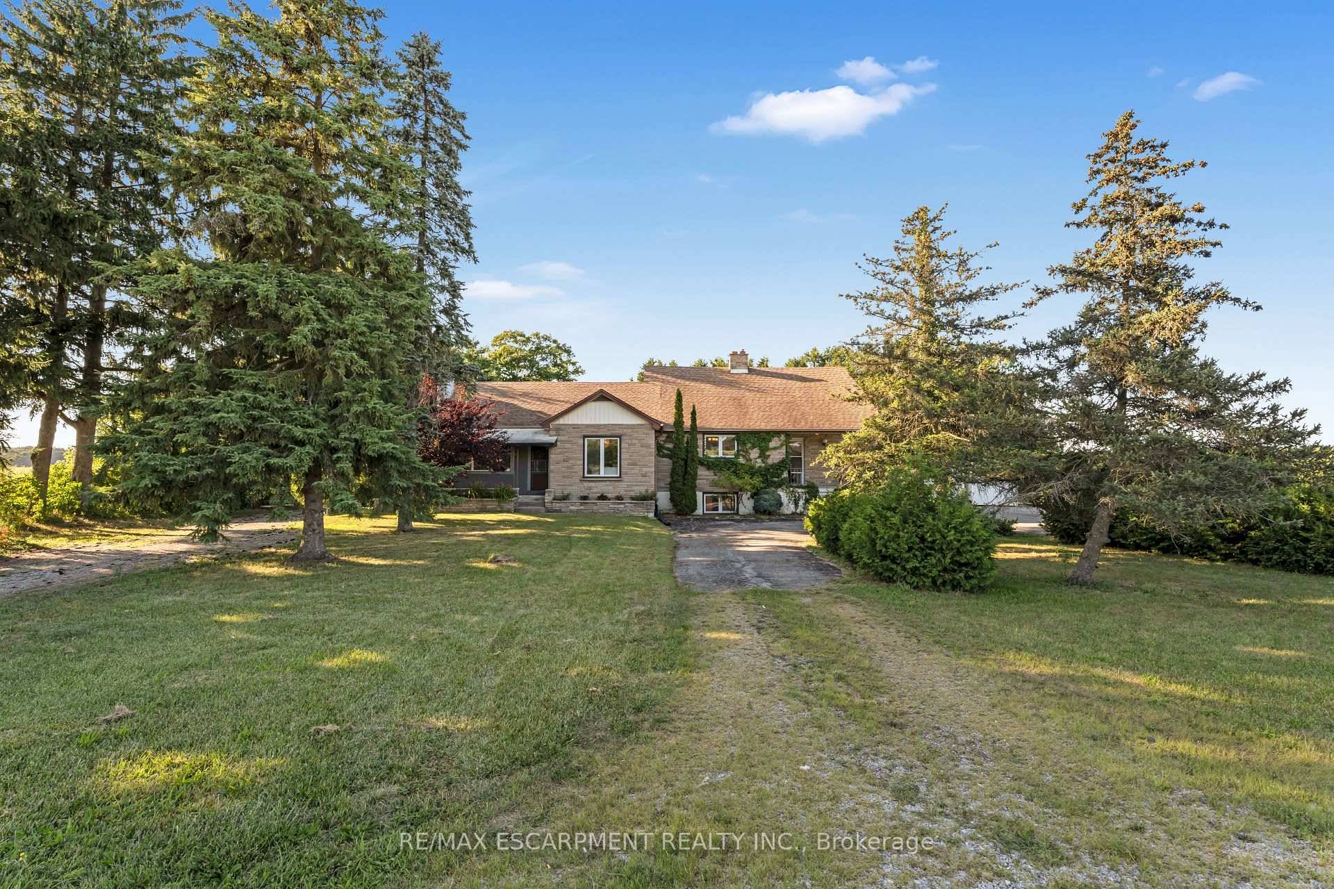Welcome to 2865 Highway 3, a beautifully updated 1, 700 sqft limestone bungalow tucked away on a generous 0.