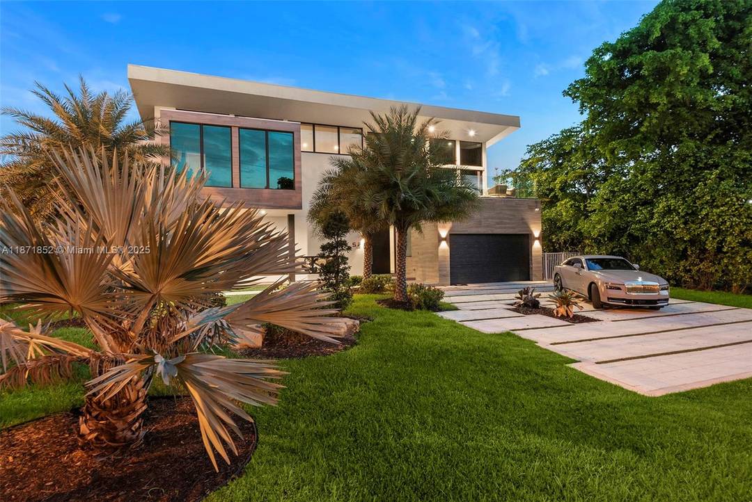 Step inside 521 Holiday Drive, located in the exclusive gated community of Golden Isles.