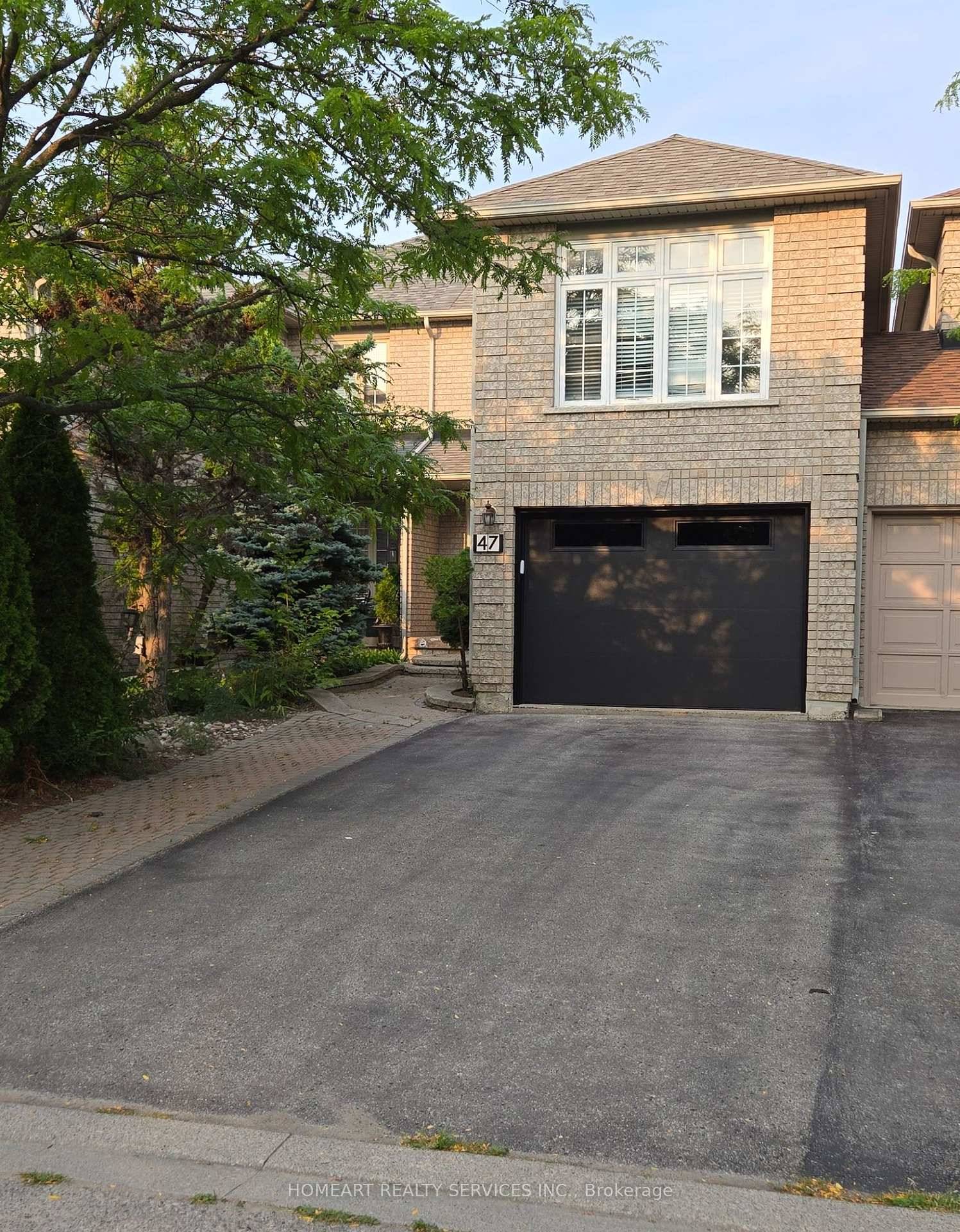 Well Maintained Freehold Townhouse in the Highly Sought After Rouge Woods Community.