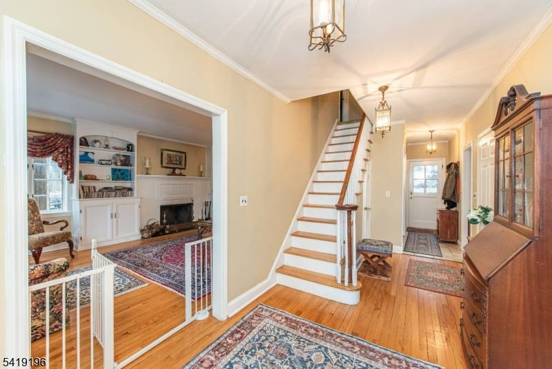 Step into timeless charm with this beautifully preserved 1947 Colonial, where character and warmth meet modern day living.