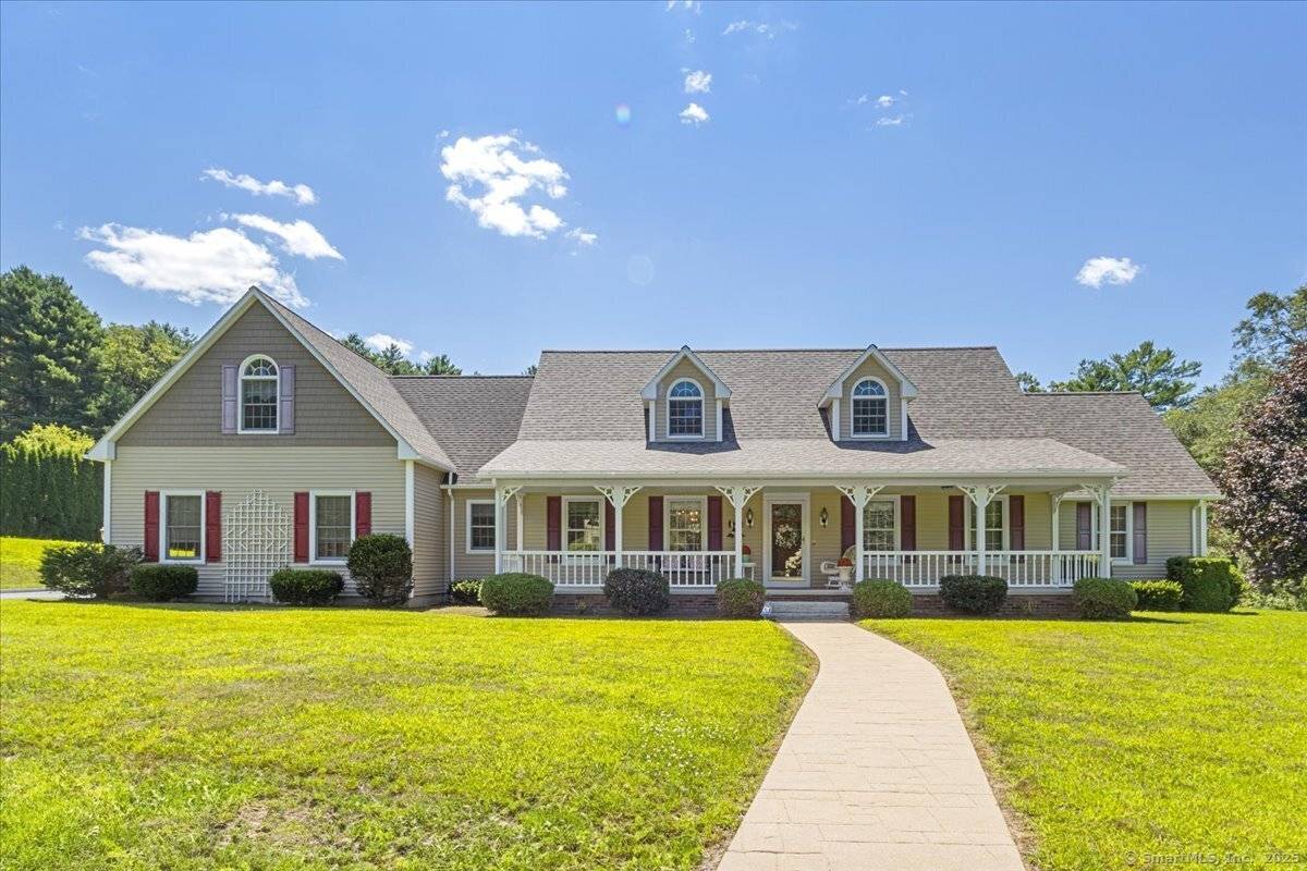 Welcome to 133 Munyan Road in Putnam, Connecticut a beautifully maintained and private retreat nestled on over 4 acres of picturesque land.