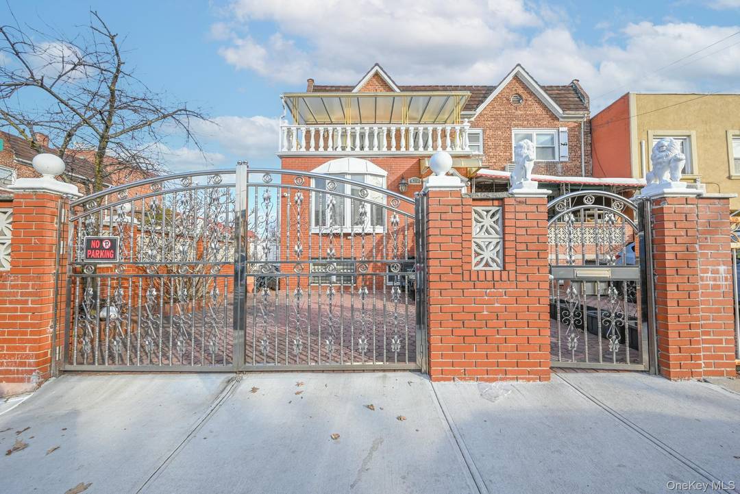 Welcome to this beautifully renovated legal two family brick home, perfectly located in the heart of Forest Hills.