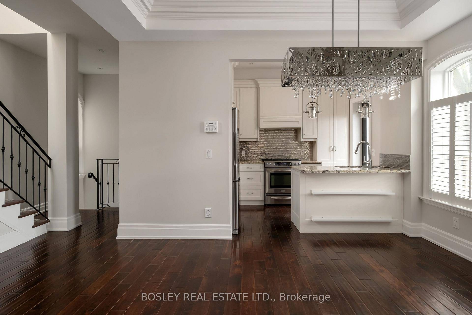 Located on the upper floors of a Victorian mansion, this bright and spacious townhouse style condominium is perfect for working from home, entertaining and relaxing inside and out.