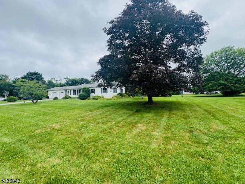 Welcome to this charming 3 bedroom, 2 bath ranch situated on a generous 0.