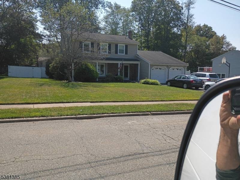 Beautiful Large Colonial, this home offers large living room, formal dining room chandelier is not included in sale, large eat in kitchen with 42 inch cabinets sliders to a deck, ...