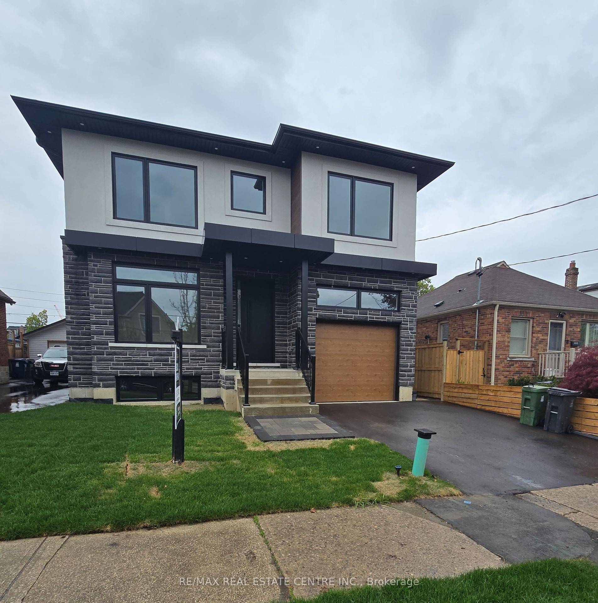 Welcome to 404 Melrose, an exceptional custom built residence offering modern luxury and thoughtful design in the heart of Mimico.