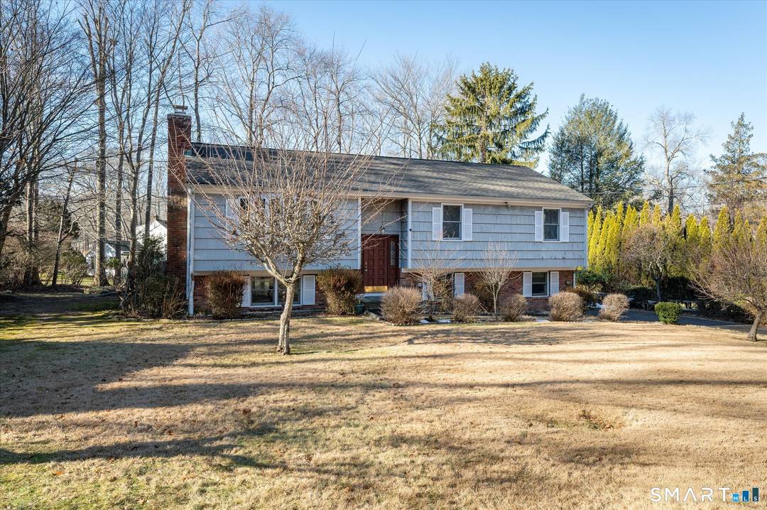 Located in the desirable Westover neighborhood, this well maintained Raised Ranch is set well back from the road on a private, flat 0.