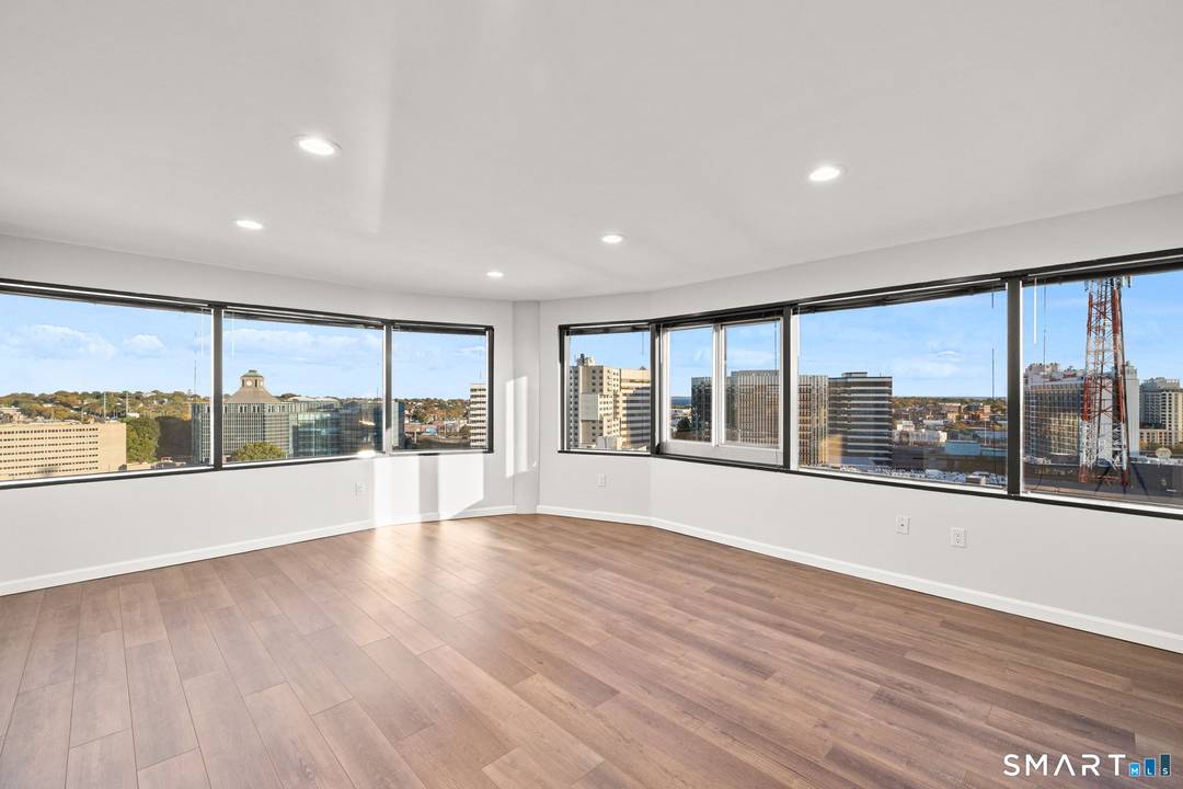 Welcome to 127 Greyrock Place, Unit 1712, an exceptional 17th floor TOP floor corner unit at The Biltmore with breathtaking panoramic views of the city skyline and Long Island Sound.
