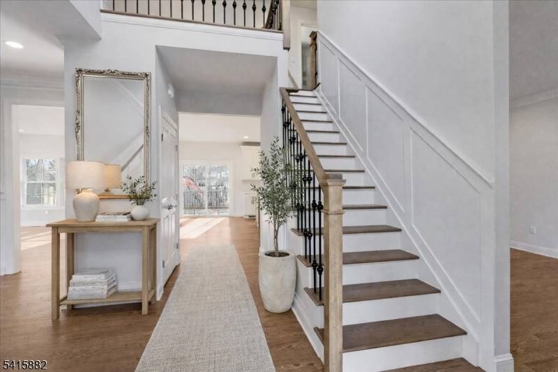 Set on a wide lot in Berkeley Heights Twp, 181 Maple Ave delivers refined new construction living with custom millwork and a bright, open layout.