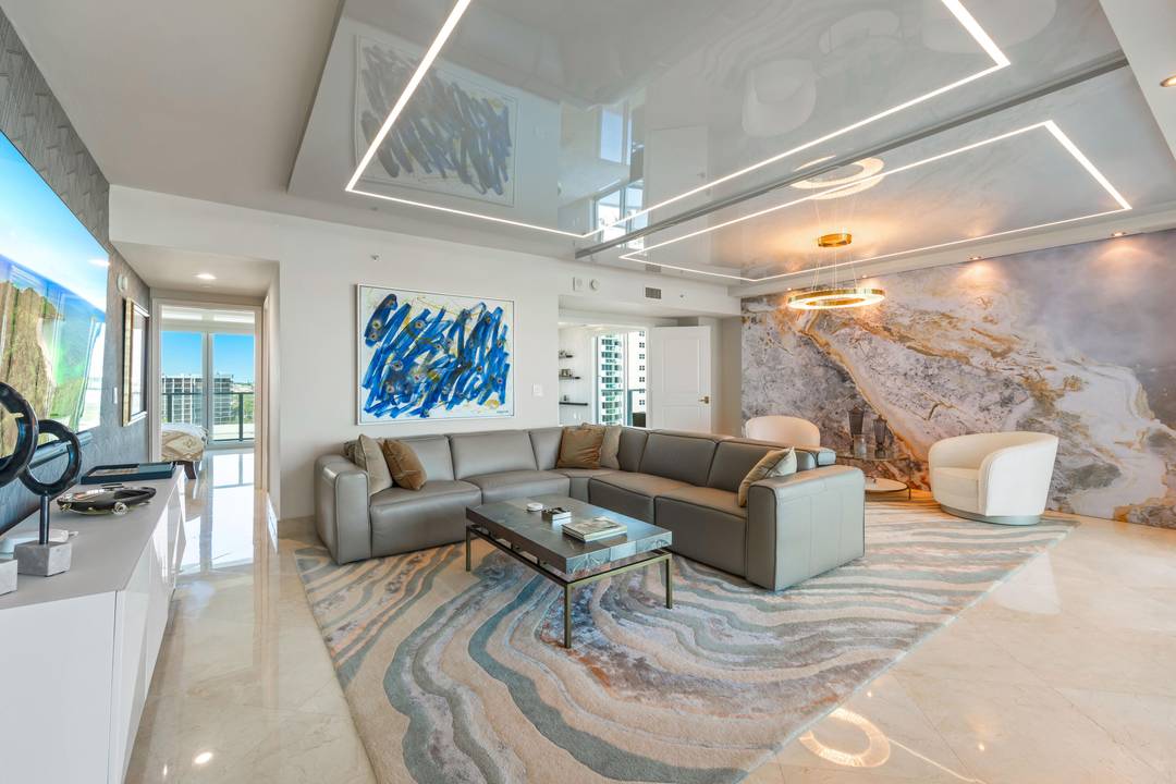 Experience elevated coastal living in this exclusive ninth floor residence at the Ocean Palms.
