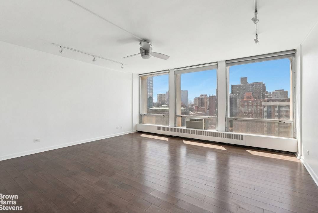 Bright, oversized alcove studio perched on a high floor at Kips Bay Towers, offering open city views and great natural light throughout the day.