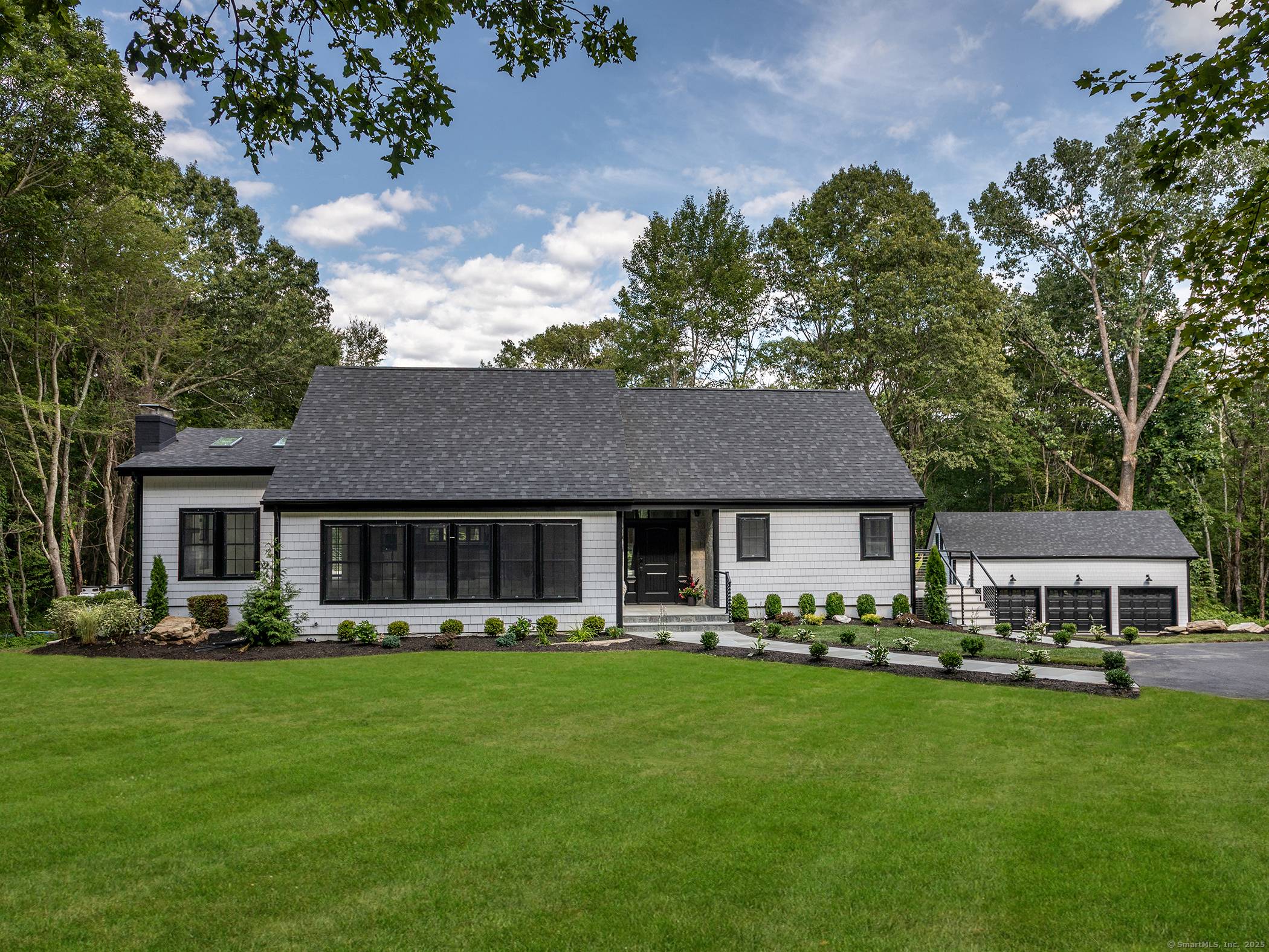 This stunning property has undergone an extensive, down to the studs renovation, creating a home that feels brand new.