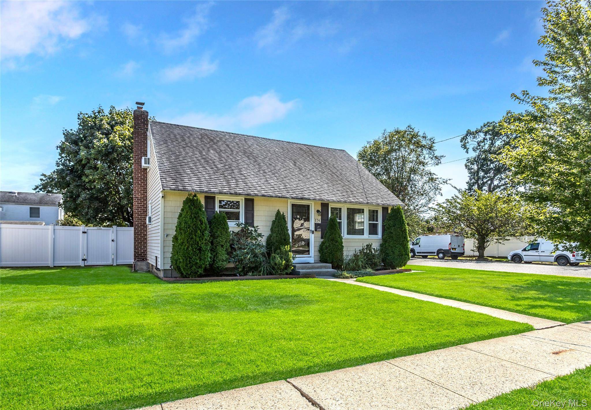 Delightful Cape on a Corner Lot with Pleasant Curb Appeal.
