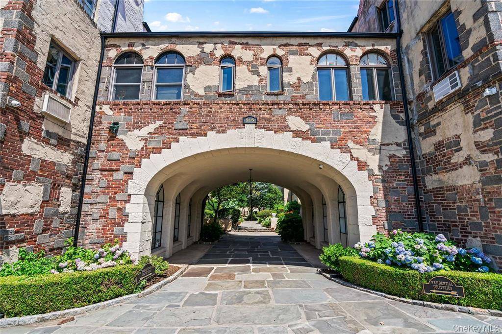 Arrive at your little slice of Italy in the middle of Great Neck Village Tuscan style Complex with super charming Central Courtyard This updated and breathtaking, Top Floor Apt.