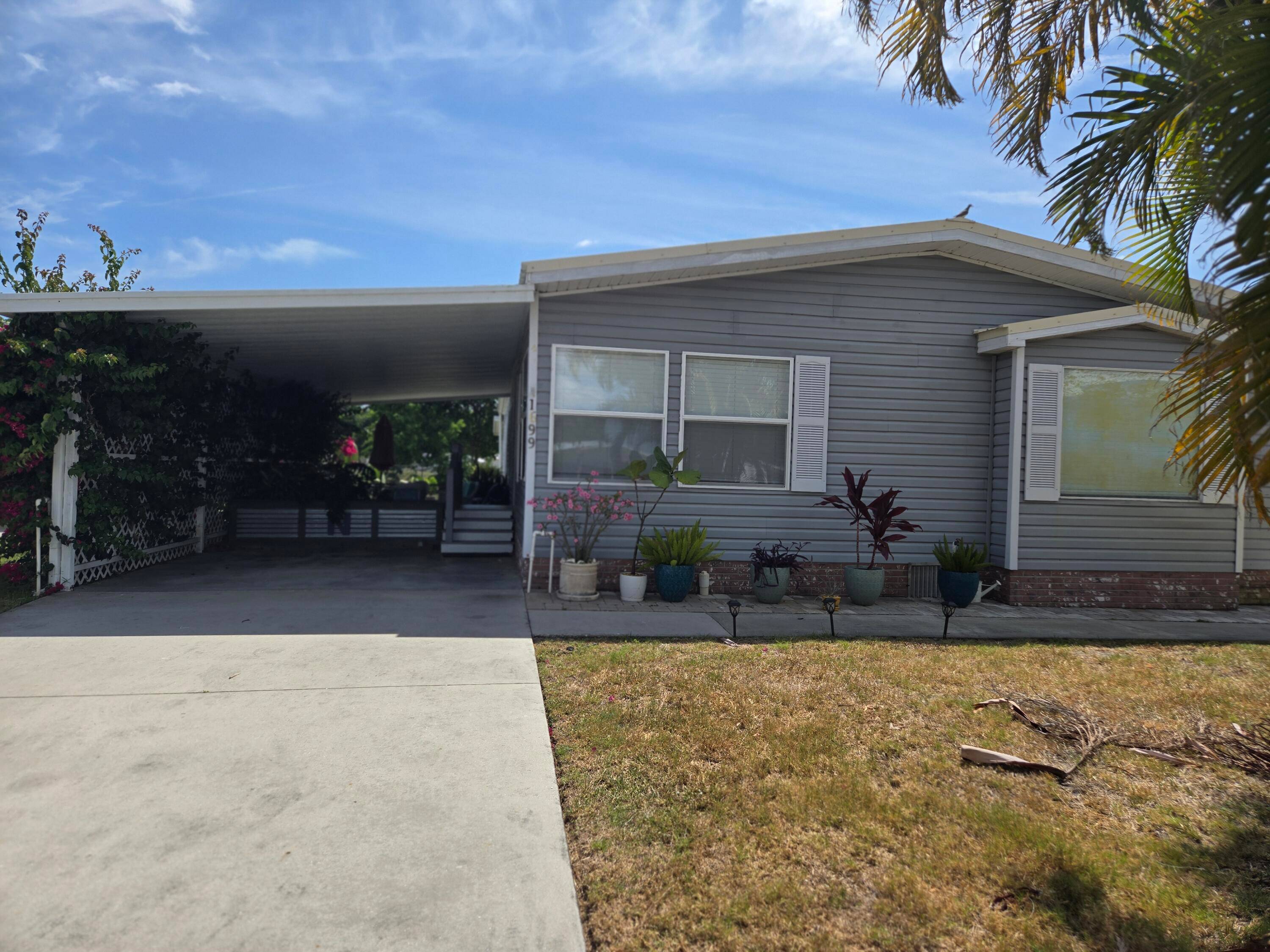 SEMINOLE COVE DWMH with 3 2 with 1, 793 sf under air and a total of 2, 719 sf under roof.