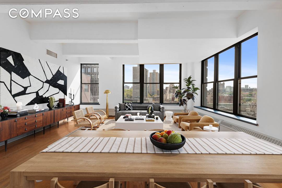 Come view this extraordinary corner loft at DUMBO s coveted Sweeney Building !