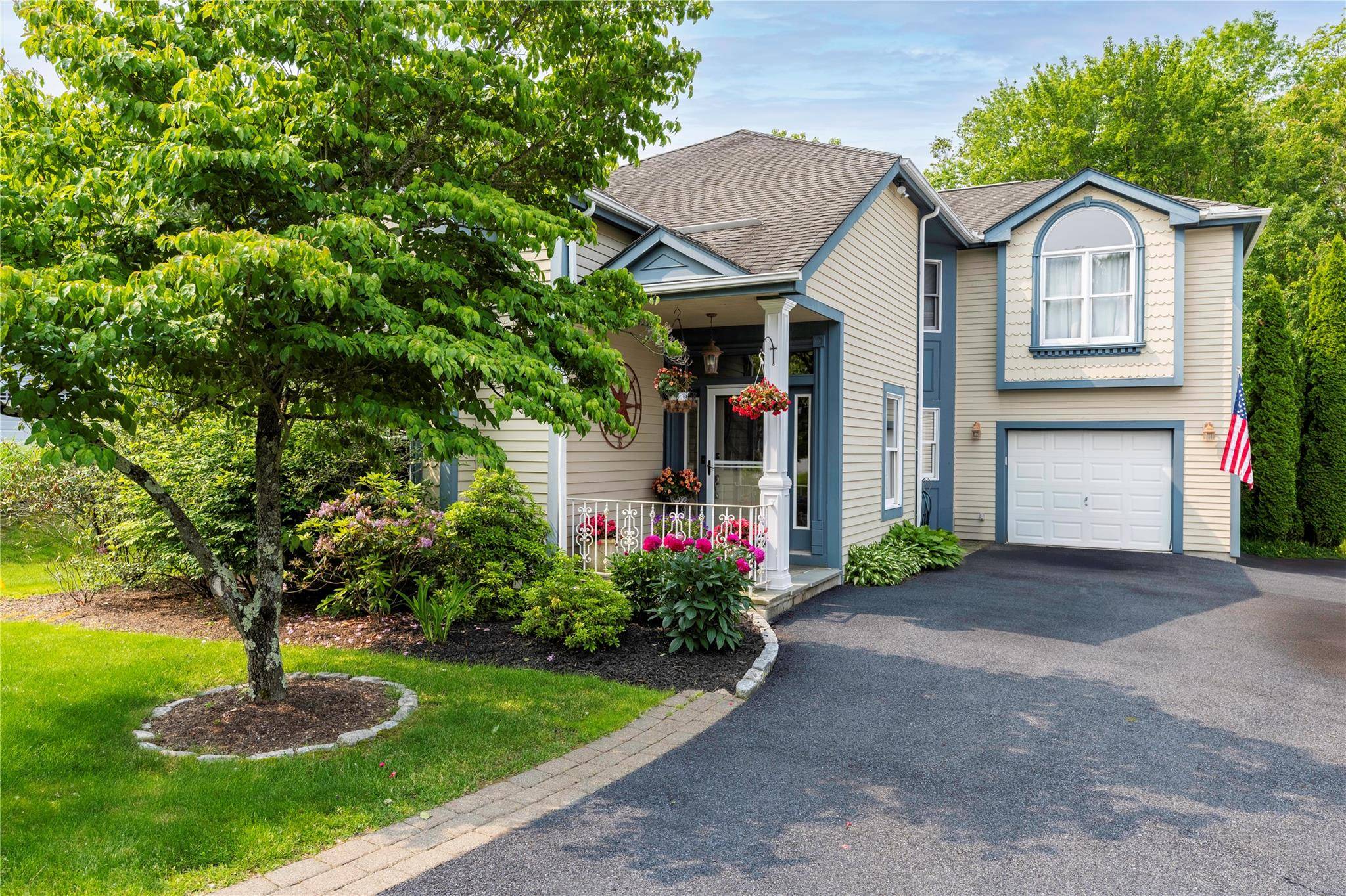 Welcome to this stunning contemporary colonial located on a quiet cul de sac in the desirable Hunters Run community.