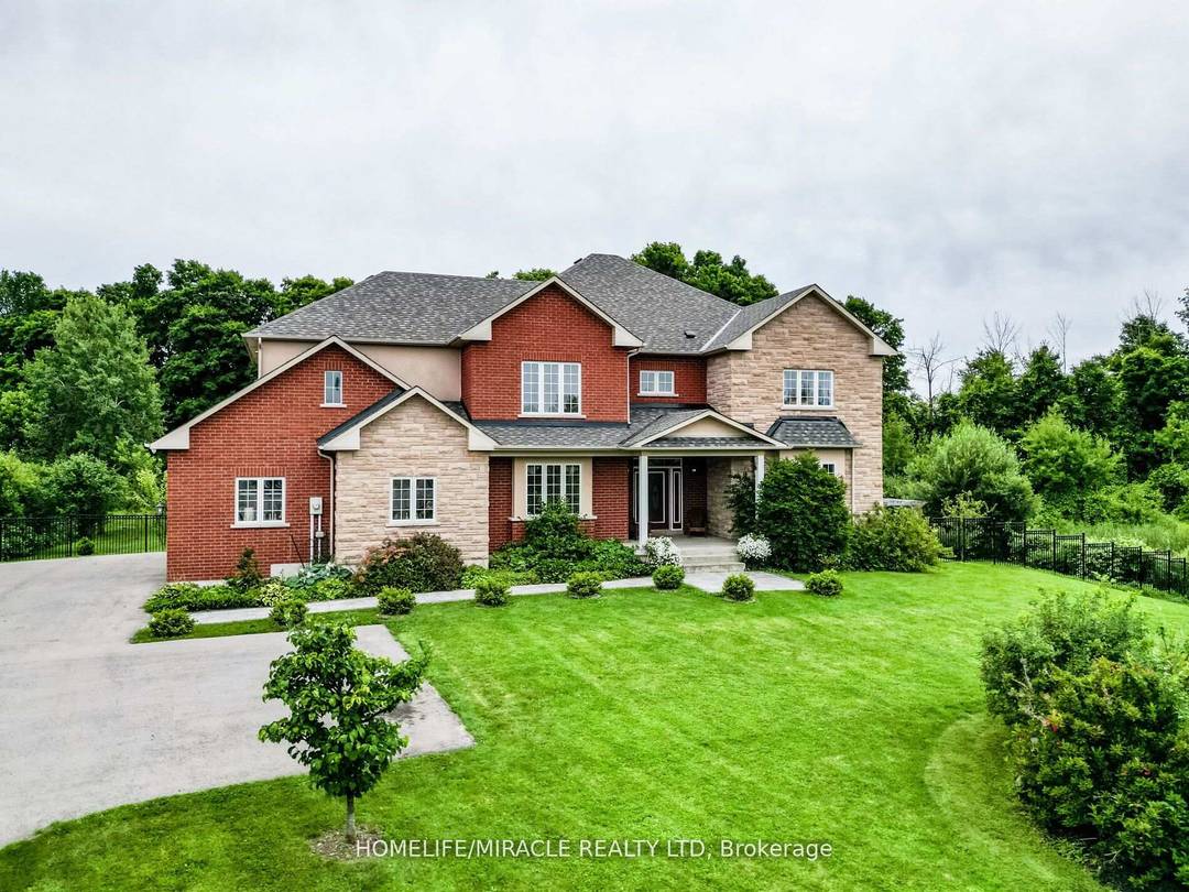 This 2 acre property is nestled at the end of an exclusive cul de sac with a stunning 4 2 bedroom home.