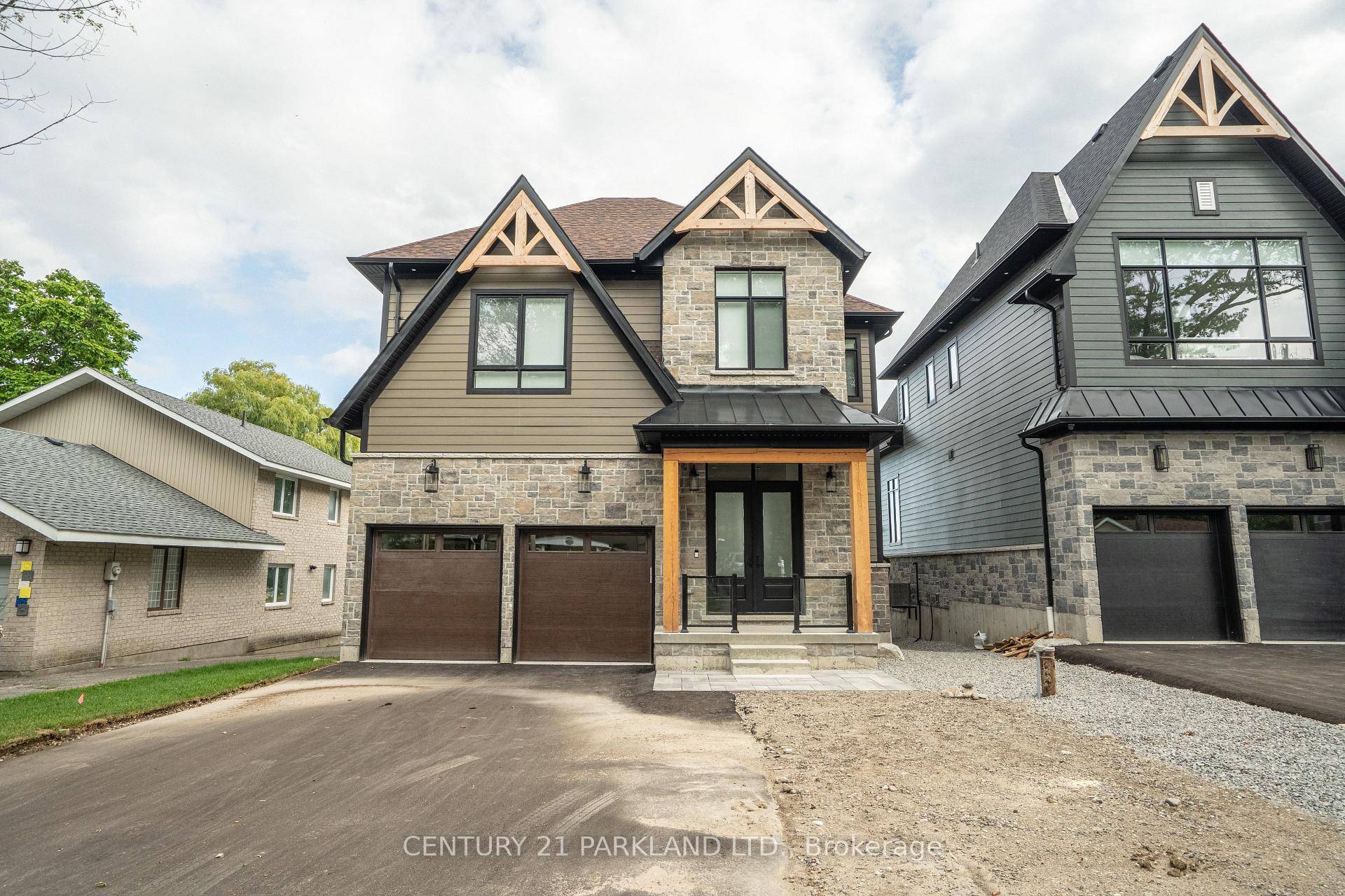 Experience the pinnacle of waterfront luxury with this breathtaking, newly built cottage nestled along one of Georgian Bays most desirable and expansive sandy beach stretches.