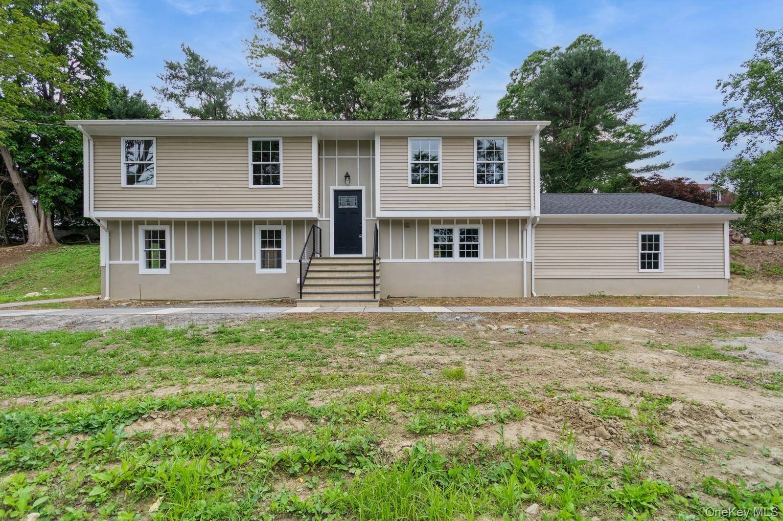 Welcome to this completely updated 3 bedroom, 3 bath home lives like a 4 bedroom.