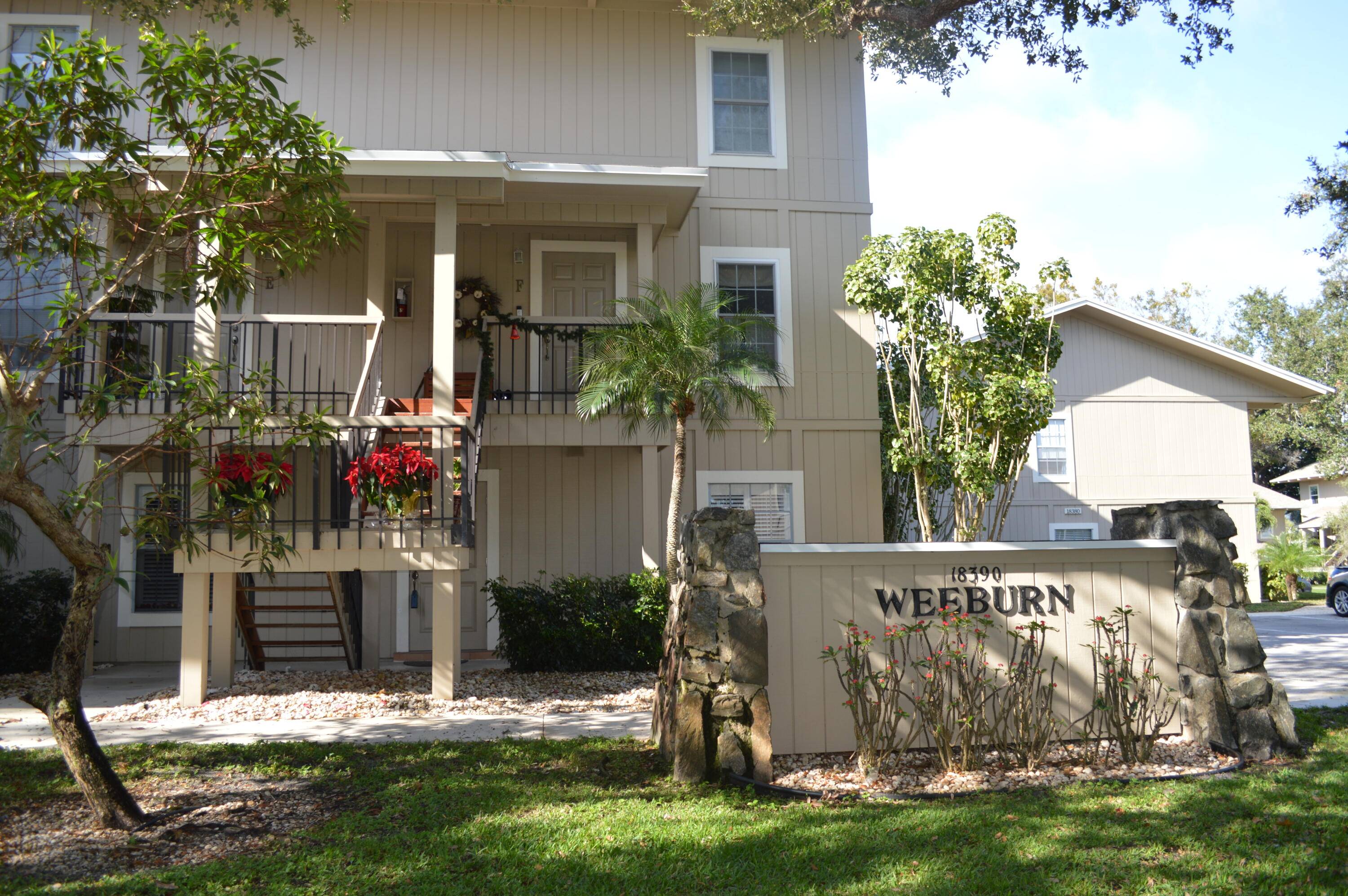Live the peaceful Florida lifestyle in this tastefully renovated 2 bedroom, 2 bath, first floor unit with fully screened patio overlooking park like grounds and golf course.