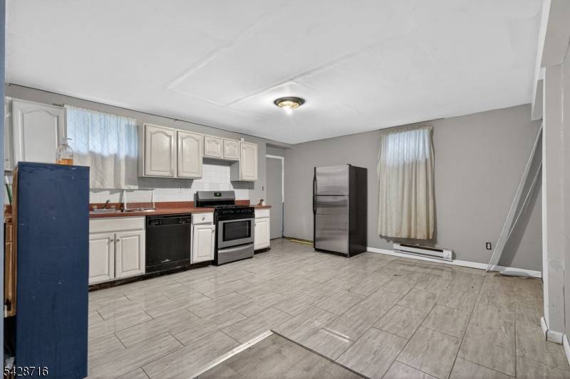 Spacious and versatile multi level property located in the heart of Paterson !