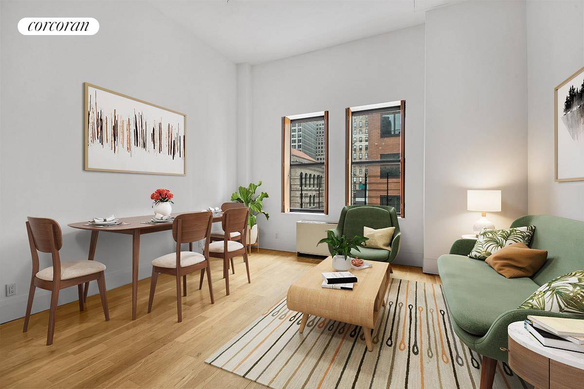 Unit PHB is a top floor 1BR 1BTH with loft like 13 ceilings, and a roof deck above with 360 degree views of downtown Manhattan.