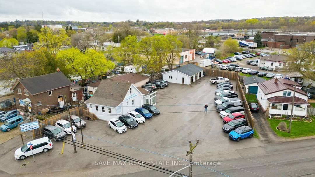 Exceptional exposure and versatility define this approximately half acre property, commerciallyzoned SC2 10 Geowarehouse, ideally situated along high traffic Highway 7.
