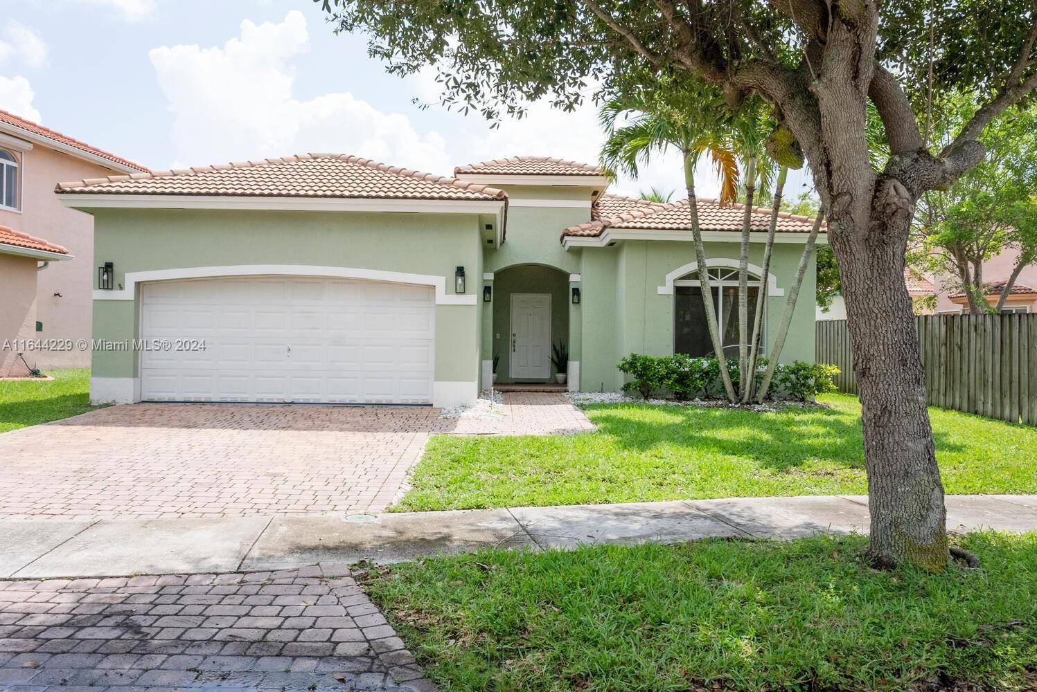 Beautifully Maintained Lakefront 3 2 home nestled in the Highly Desired Gated Community of Keys Landing.