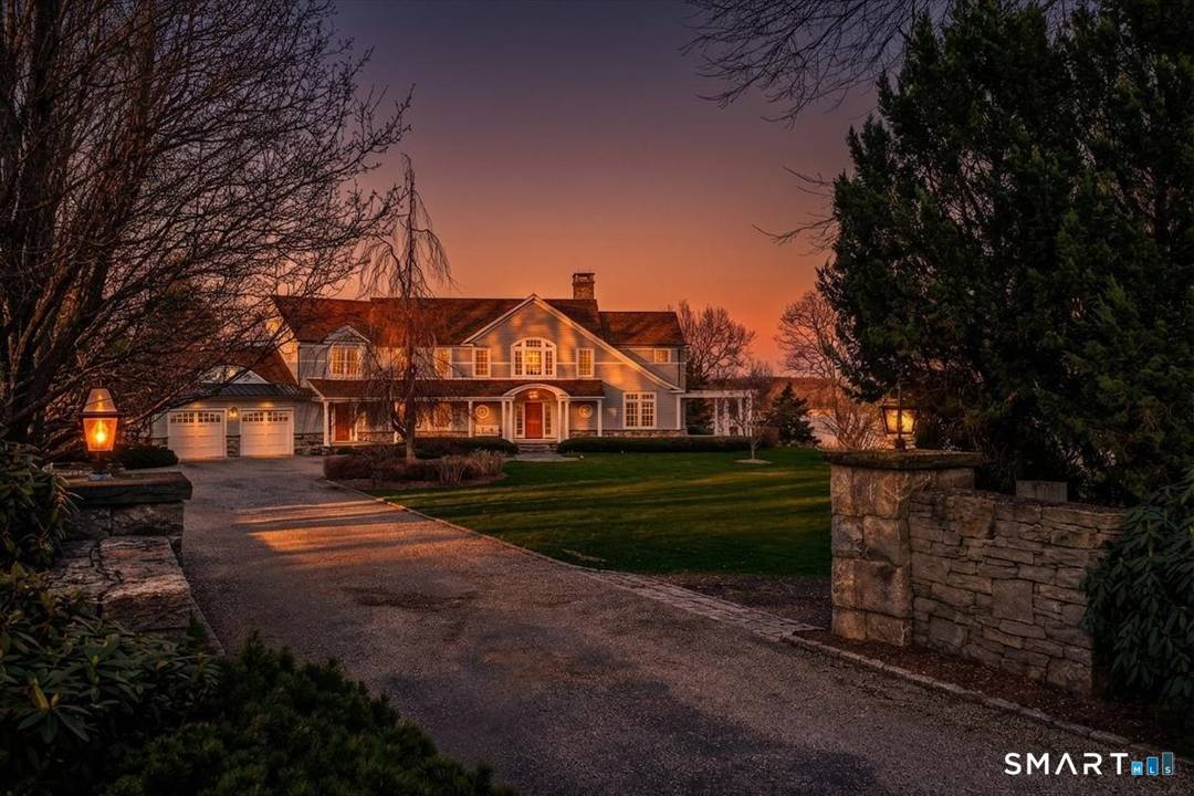 Set along one of Essex's most coveted stretches of River Road, this exceptional waterfront estate offers a rare blend of understated elegance, privacy, and Connecticut River waterfront.