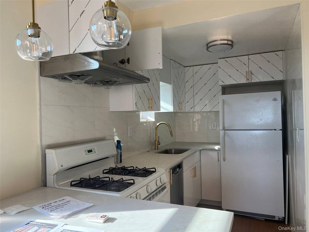 In The Heart Of Flushing, New Fully Renovated 2 Beds Condo, New Hardwood Floor, New Kitchen, New Bathroom, New Windows And New Doors.