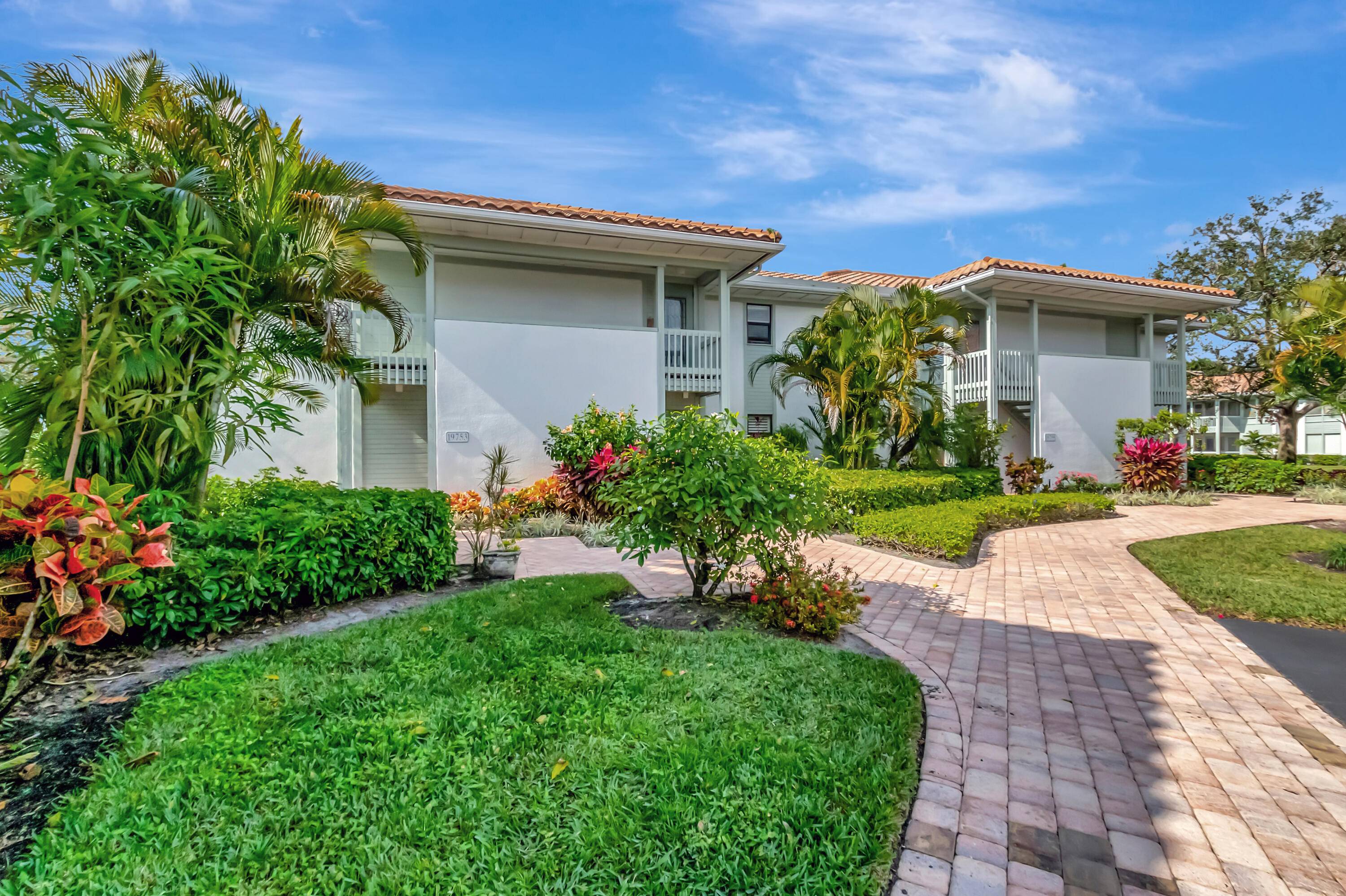 Quail Hollow 2 bedroom, 2 bath 2nd floor garden apartment with Magnificent wrap around unobstructed water view in both directions plus the golf course in the distance.