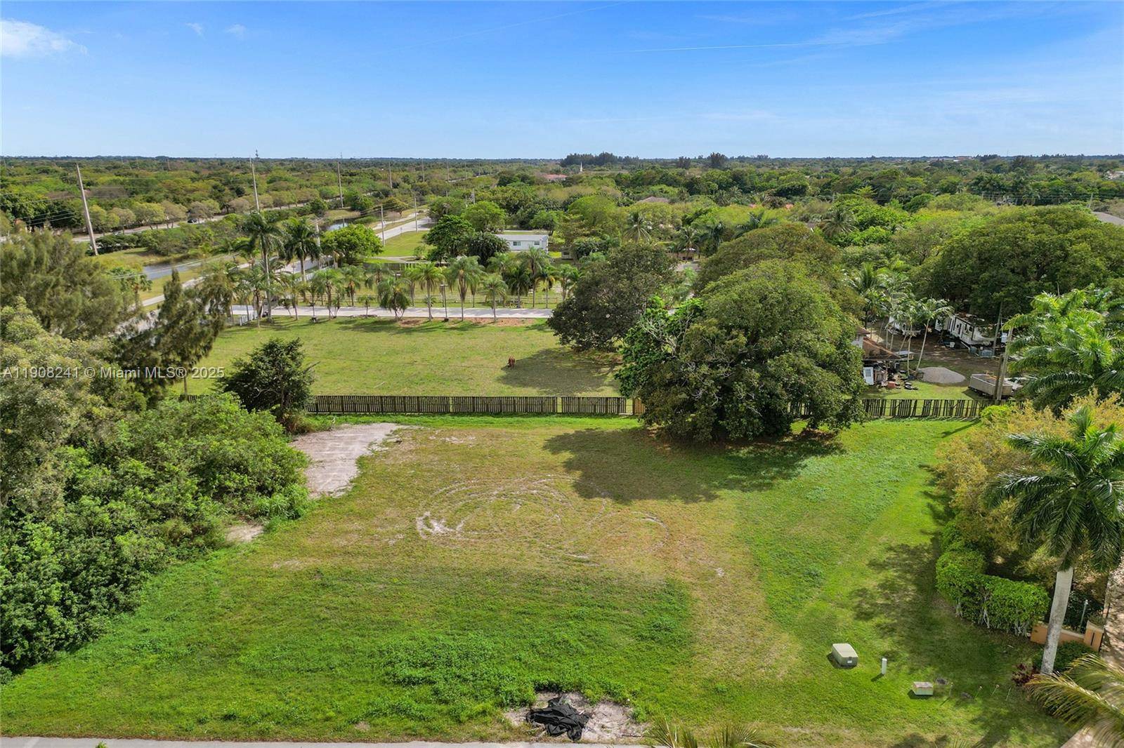 Own this beautiful READY TO BUILD lot for your dream home in prestigious PLANTATION ACRES !