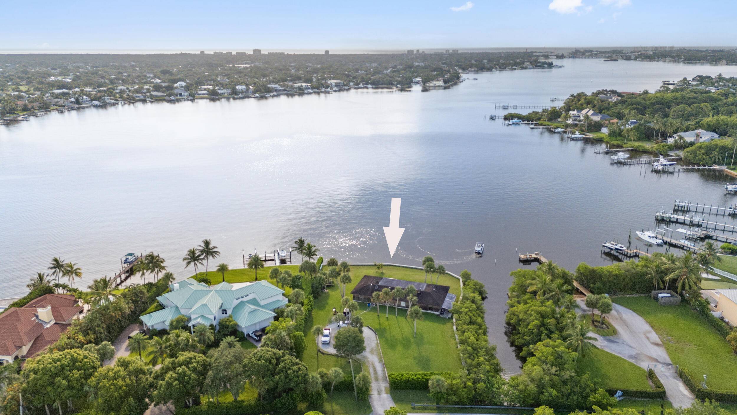 Mile long eastern views on the Loxahatchee River are yours from this prime building lot, just a 10 minute boat ride to one of a dozen water access restaurants and ...