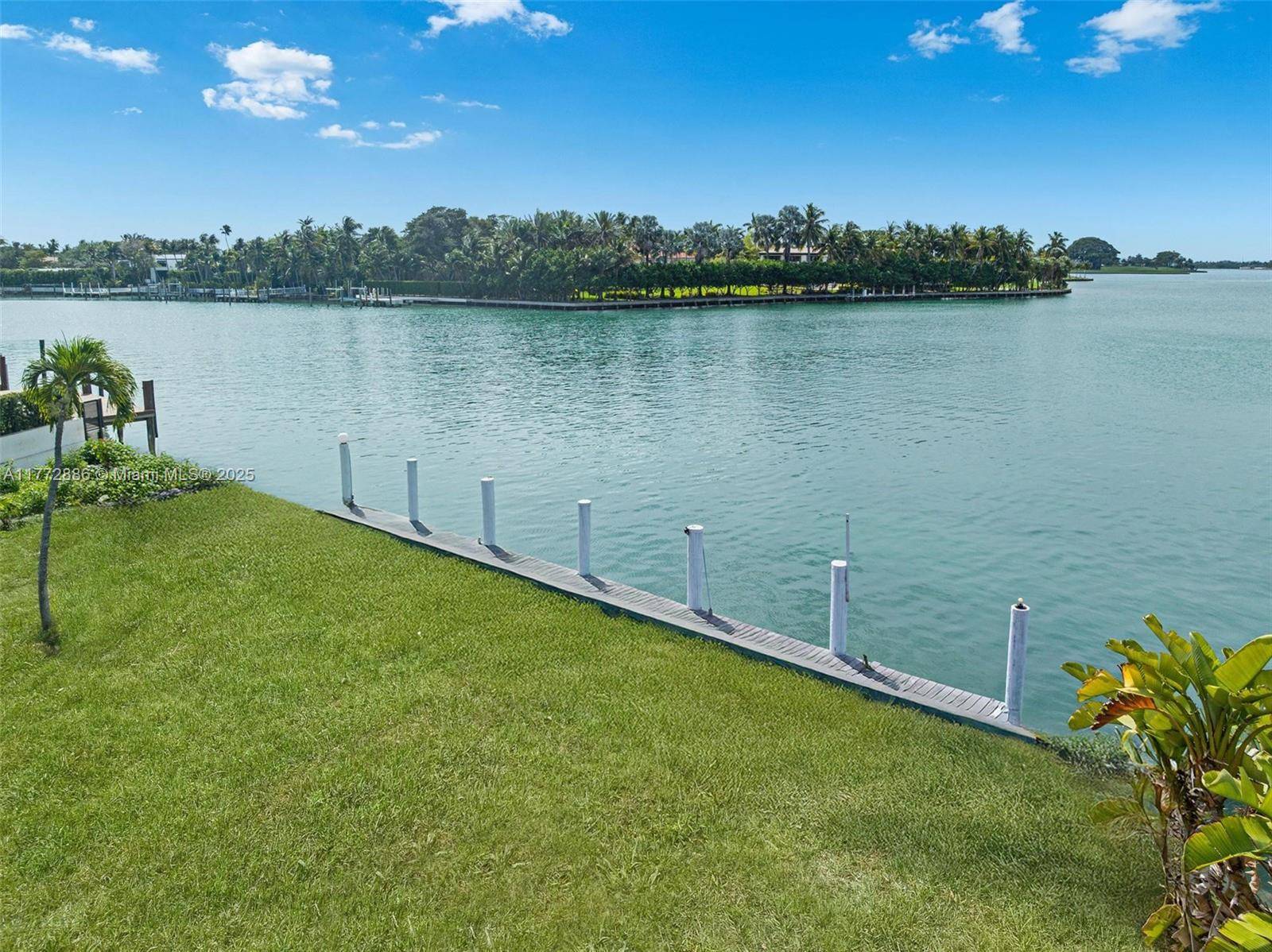 Seize the opportunity to own the largest lot in Surfside, an expansive 27, 500 SF waterfront property with breathtaking views of the waterway and the prestigious Indian Creek Island.