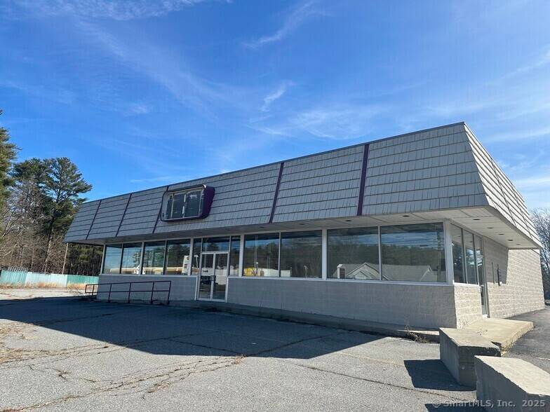 Prime commercial property offering an unbeatable high traffic location and endless possibilities !