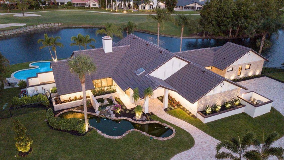 Welcome to 910 Greensward Ln, a stunning contemporary single family home nestled on a desirable corner lot in beautiful Delray Beach, FL.