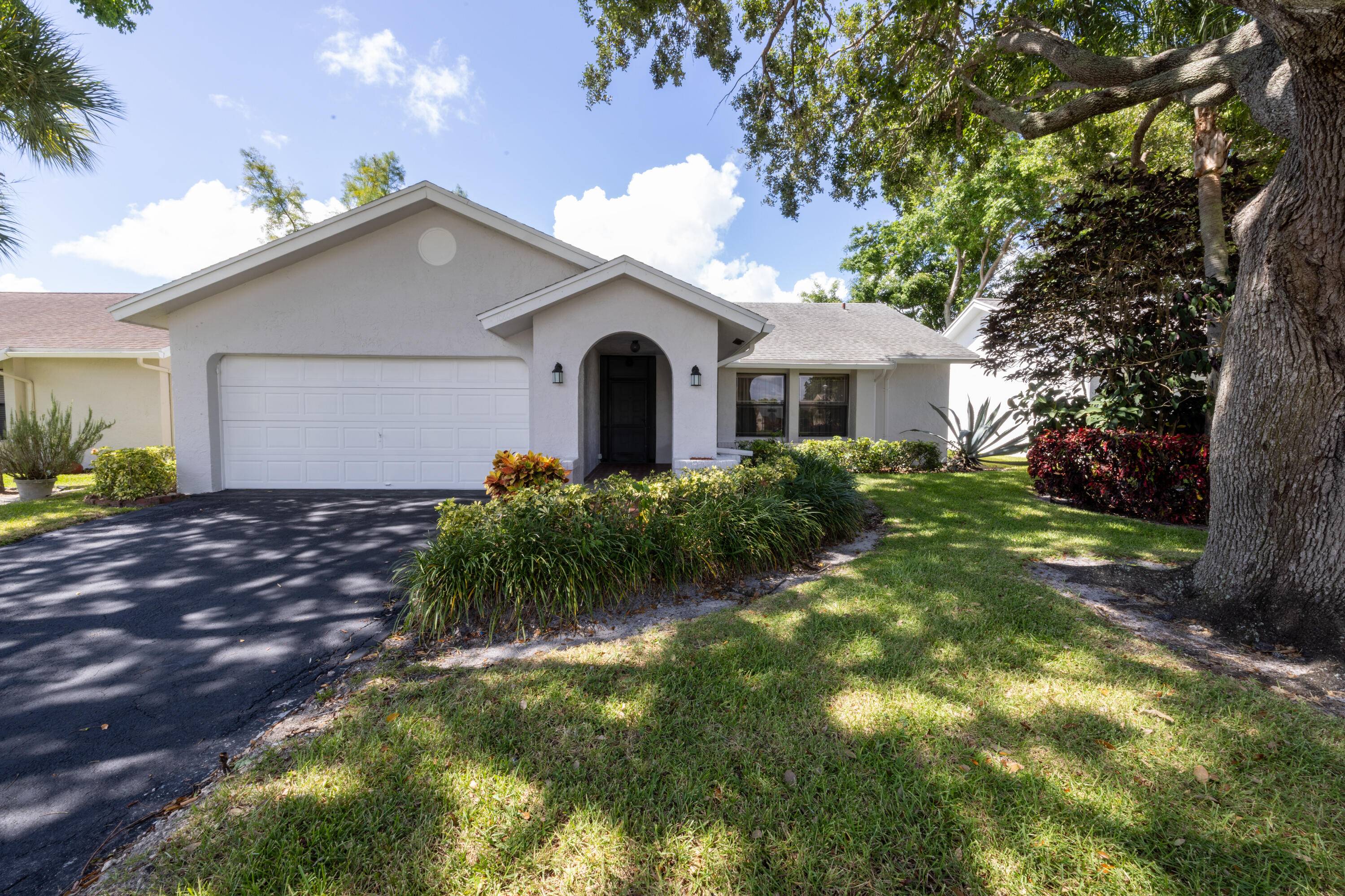 Located in Boca Chase Waterberry 55 community, this well maintained 3 bedroom, 2 bath single family home offers 1, 857 square feet of comfortable living.