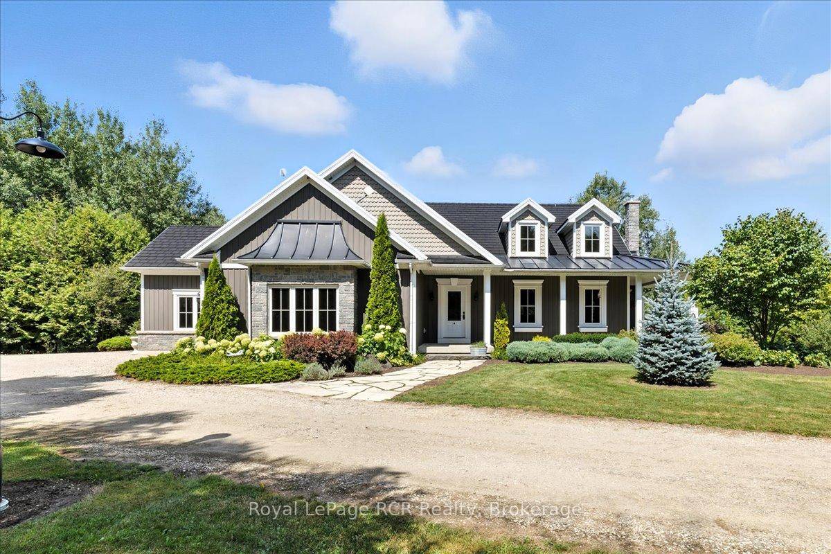 On 10 acres in Wellington North, this executive stone bungalow combines luxury, comfort, and country living.