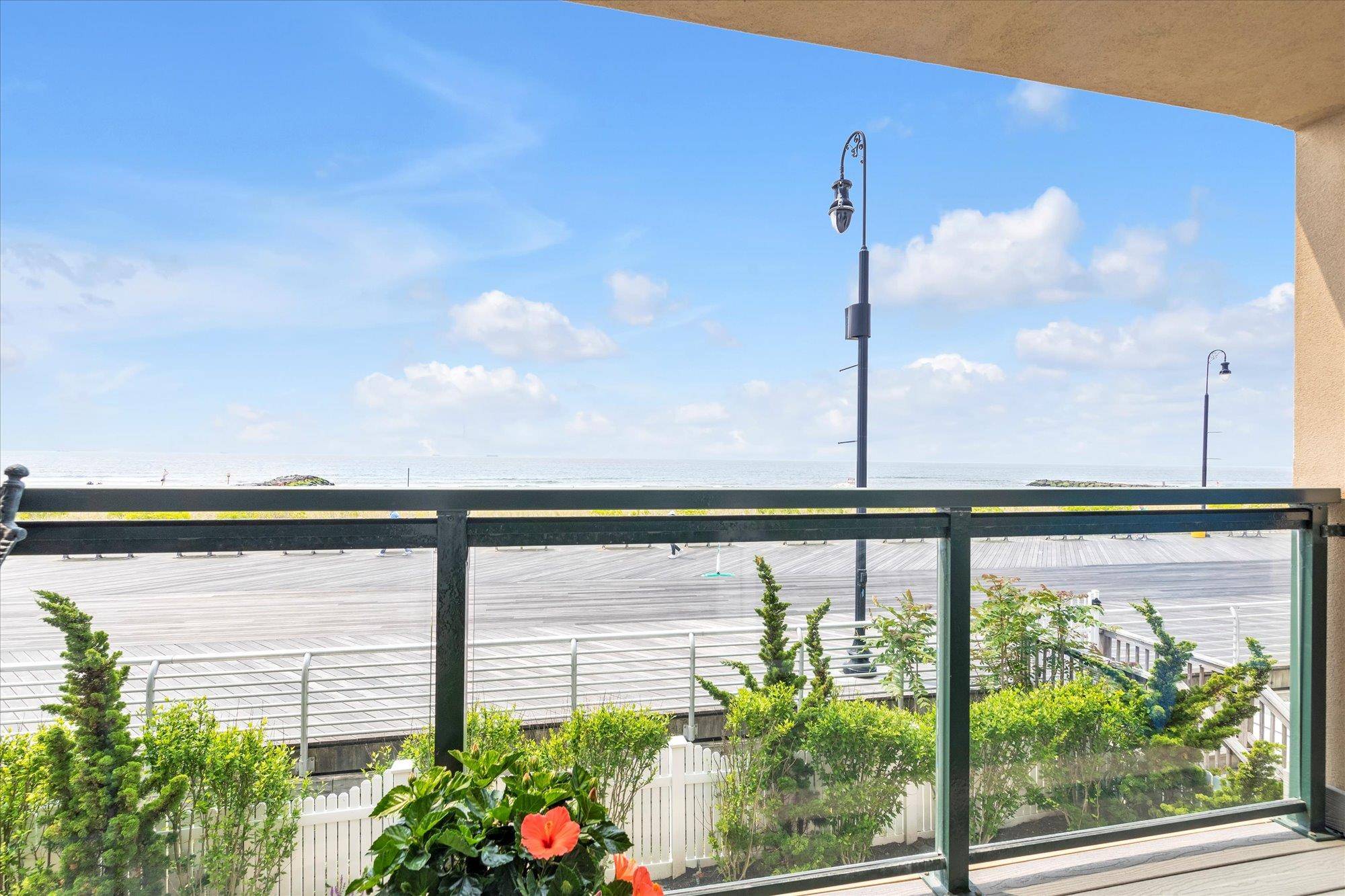 Discover this stunning oceanfront townhouse nestled on the beautiful Long Beach boardwalk.