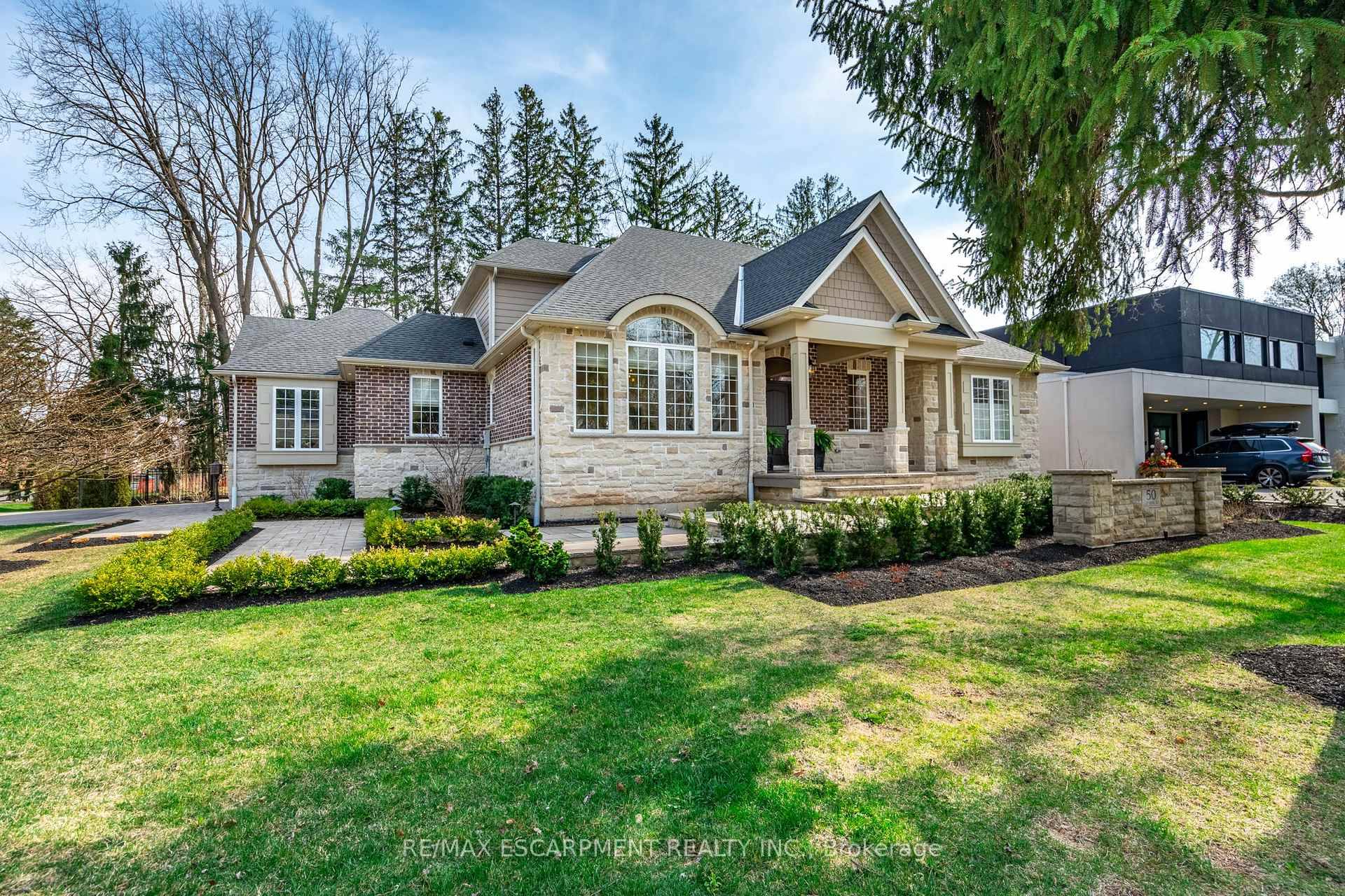 Experience refined living in this exquisite 3 1 bedroom custom built luxury home, nestled on a prestigious corner lot in the heart of Ancaster.