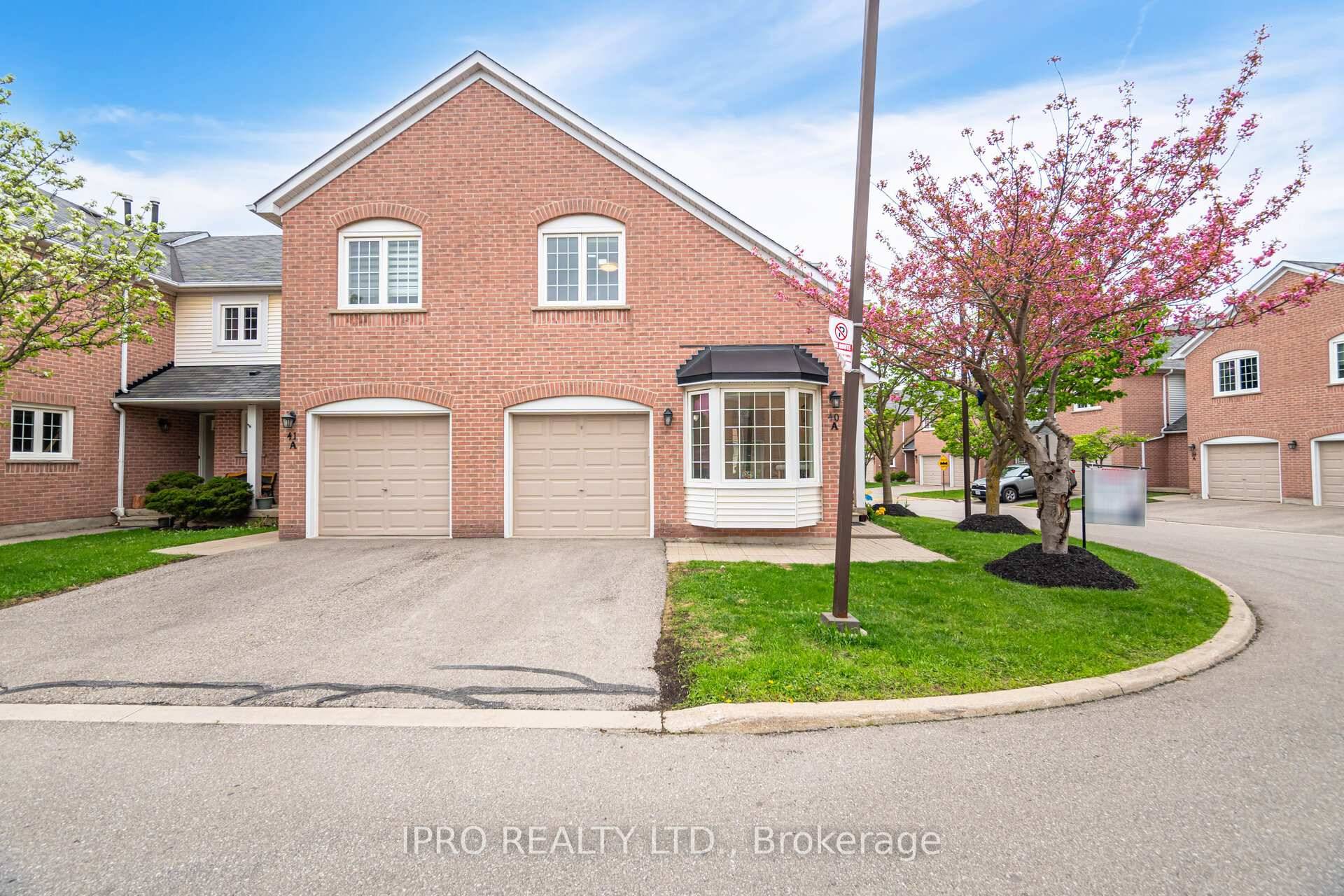 Desirable corner townhouse offering extra privacy and natural light from additional windows at excellent location in central Erin mills.