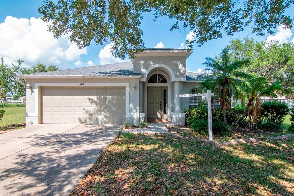 Expansive Lot Bright Airy 4 Bedroom Home with New Roof ACSet on an oversized 0.