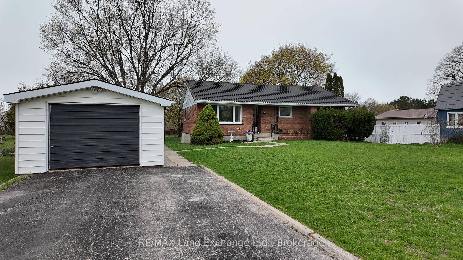 Welcome to this beautifully updated 4 bedroom, 2 bathroom all brick bungalow nestled on a spacious 0.
