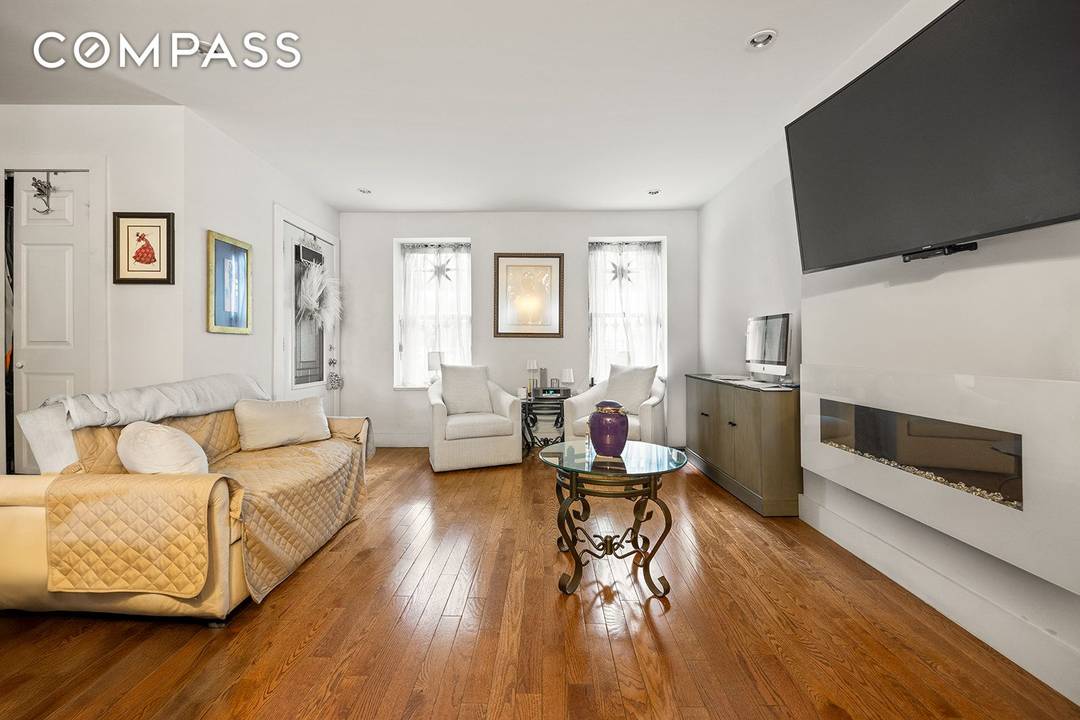This exceptional townhouse located at 621 Putnam Ave is a true gem.