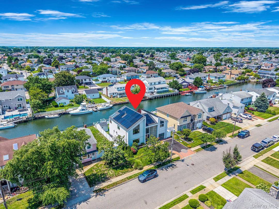 Waterfront Colonial with Unmatched Canal Views amp ; Modern Luxury Welcome to this exceptional waterfront colonial, perfectly situated on the picturesque Wide Canal.