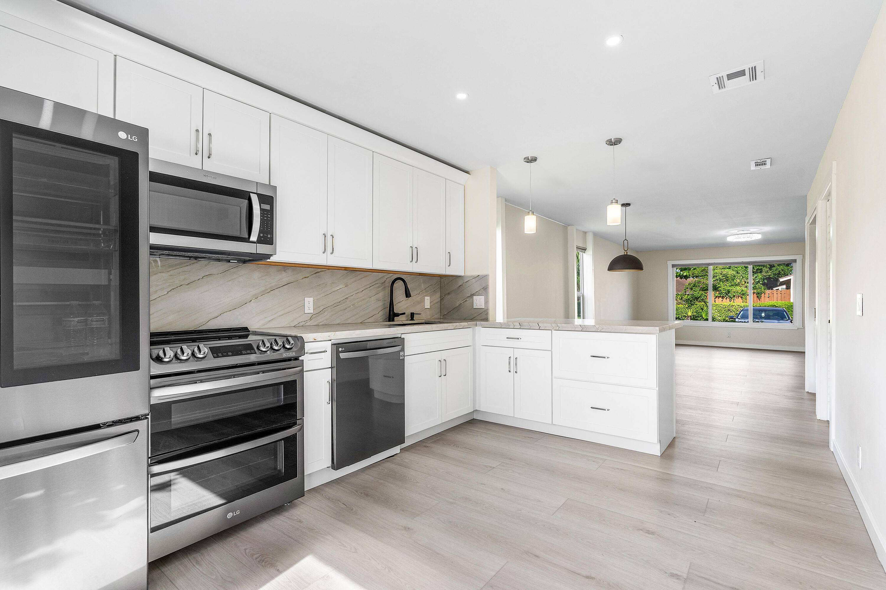Welcome to this stunning 3 2 townhome, completely rebuilt, offering a spacious and modern design.